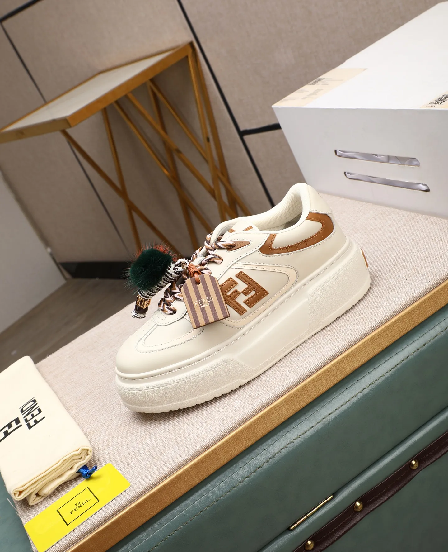 Men's shoes 💰740 Top quality Fendi Match series 25 latest colors Pendant thick sole lace casual FENDI Match lace. Made of light pink leather with white and ocher brown details. Contrast leather FF appliqué on the sides and hiking laces in white, pink and ocher brown. Thick rubber sole with oversized embossed FENDI lettering on the heel. Metal ring charm on the tongue: A small braided doll with contrasting mink fur details and gold metallic FF on the right shoe. The left shoe features a braided cord with contrasting mink double pom poms, metallic FF beads, and Pequin print pattern and logo. Upper: Original custom-made imported first-layer cowhide. Inner lining: Imported custom-made breathable mesh lining. Sole: Original open-molded ultra-light foam material. Bottom thickness: 5CM. Number of yards: women's 35-40 (custom-made 40 non-refundable).